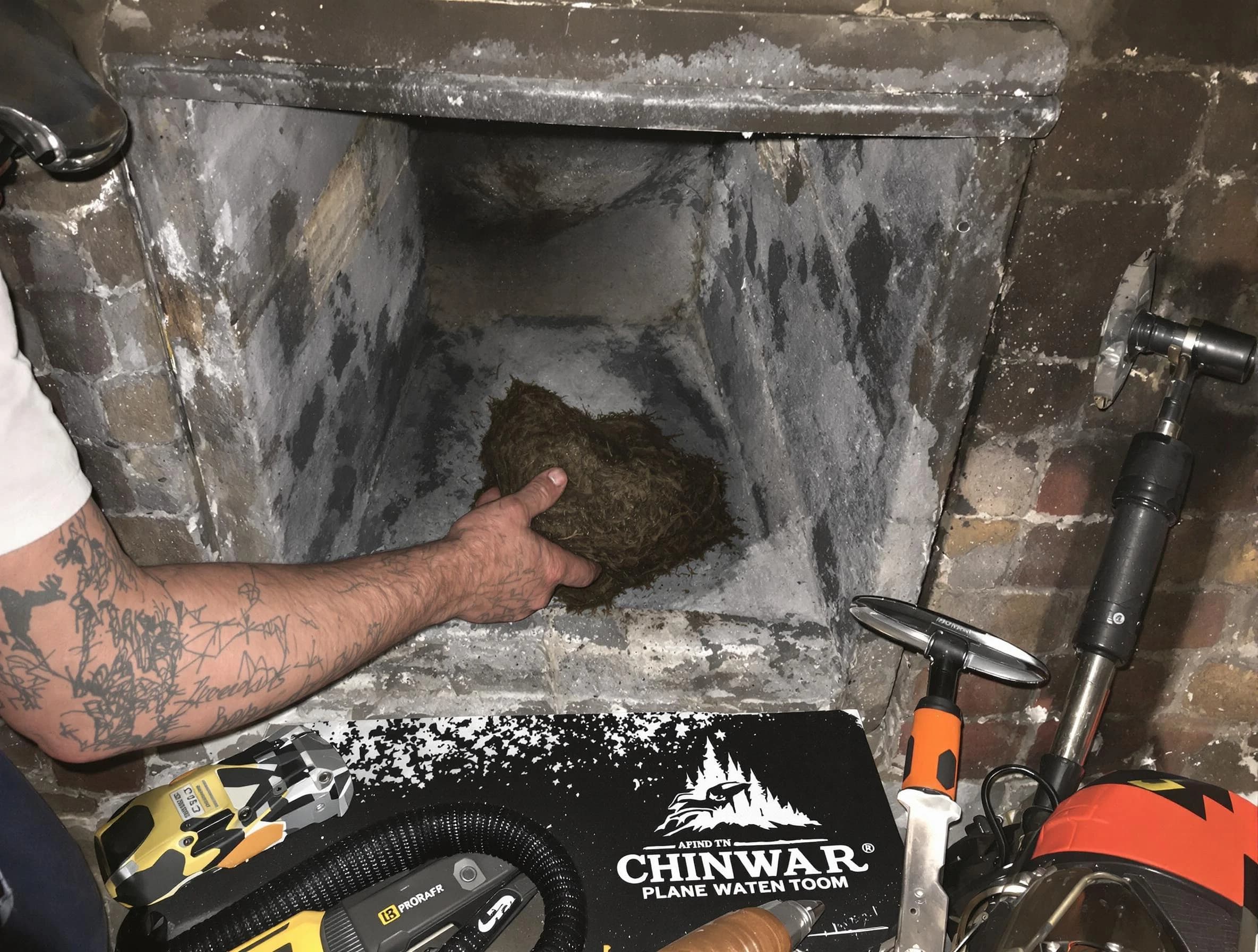 Somerset Chimney Sweep safely removing debris and screening chimney in Somerset, NJ